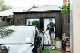 Man charging an EV
